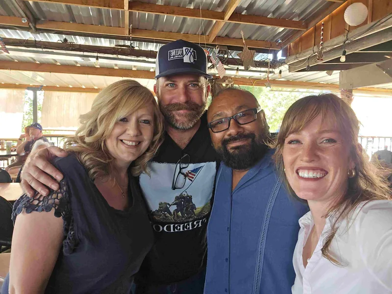 Kathryn Halling with supporters at an outdoor community gathering