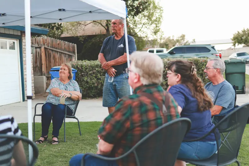 Neighbors listening at a Ward 3 meet-and-greet