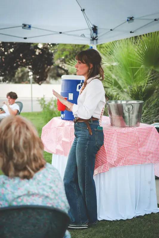 Kathryn Halling talking with residents at a neighborhood gathering