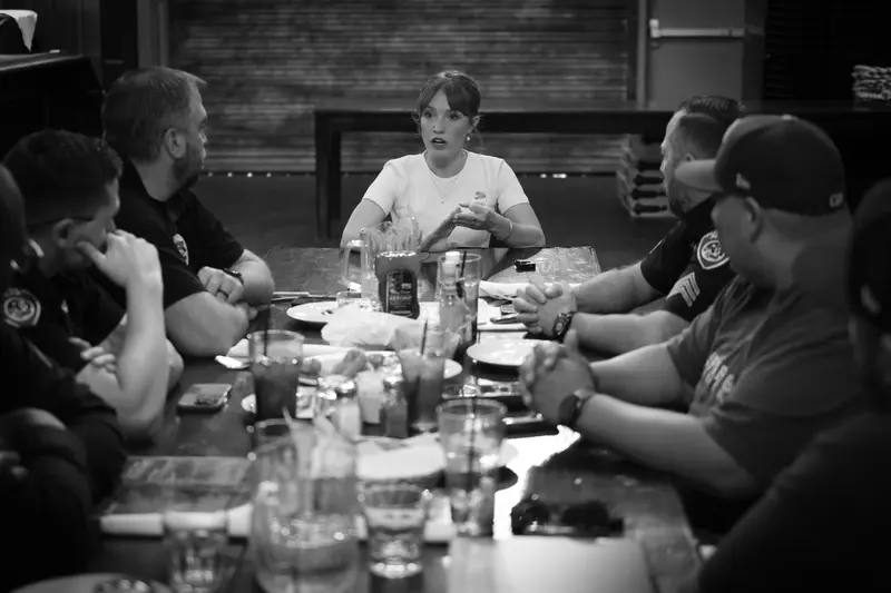 Kathryn Halling leading a roundtable with Bakersfield police officers